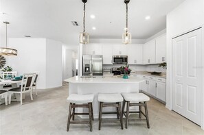 Beautiful, full-equipped kitchen overlooking living and dining areas