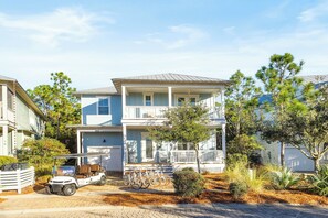 Home includes a 6 seater golf cart and 6 adult bikes. Driveway features 2 parking spaces.