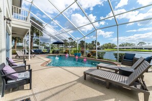 Ample poolside seating invites you to kick back and relax while enjoying the refreshing pool