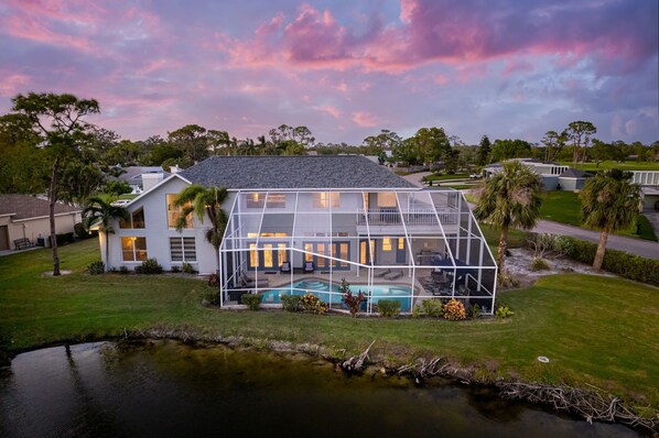 Experience luxury and relaxation in our two-story home overlooking the IMG Golf Academy Golf Course!