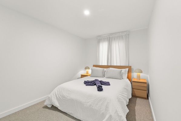 Queen bed in your bedroom #1,  with a window for fresh air and natural light.