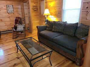 Enjoy the comfortable furniture, which enhances your cozy cabin feel. 