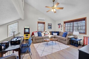 Loft Entertainment area with Pac-man games, Smart TV, DVD player, games & toys