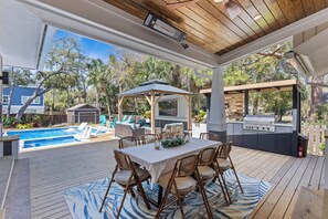 Gather the crew for a poolside dining and take advantage of brand new outdoor kitchen