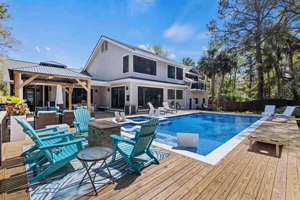 Welcome to our newly renovated home at 1 Firethorn Lane, located mere steps from the ocean in the desired South Forest Beach area.