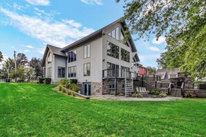 Huge yard, amazing outdoor deck space and lake views