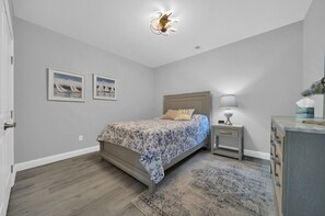 First bedroom with a queen
