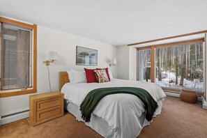 Main bedroom has a king bed, en-suite bathroom, and TV