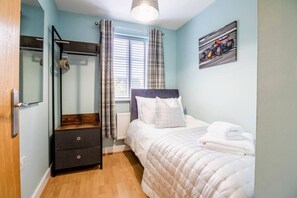 Bedroom 2 - Single bed with fresh linen and towels provided.