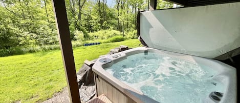 Unwind in the hot tub after a long day exploring