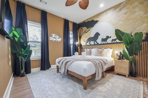"Step into the enchanting Lion King bedroom. From the hand-painted mural to the cozy bed with plush linens, this space brings the African savanna to life. #LionKingInspired #DisneyGetaway #ThemedVacation #LuxuryTravel"