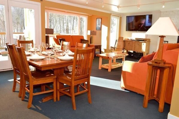 Trailside Village Condo #1 is perfect for 4 guests. Relax in the spacious living area with a smart TV, high-speed Wi-Fi, and beautiful views of the Vermont landscape.