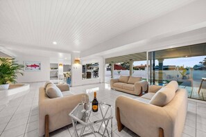 Open and spacious with comfortable seating, modern décor, and large windows offering plenty of natural light.