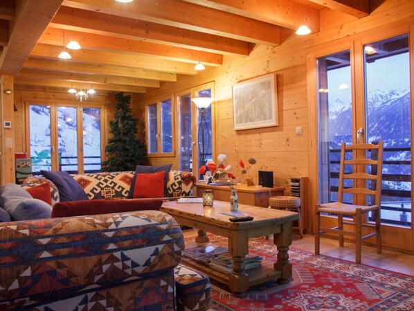 Furniture, Interior Design, Wood, Ceiling, Flooring, Table, Room, Living Room, Couch, Chair