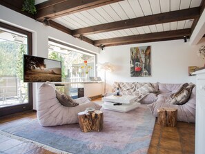 Furniture, Interior Design, Couch, Flooring, Wood, Living Room, Floor, Home, Room, Ceiling