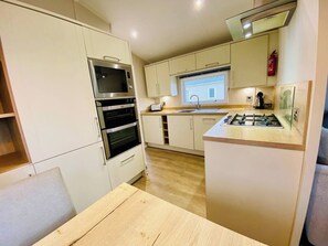 Fully equip kitchen with dishwasher 