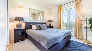 Indulge in ultimate comfort with this elegantly designed bedroom featuring chic decor, a plush bed, and natural light streaming through the balcony doors. Your serene getaway awaits! 🌟🛏️ #LagoaLuxury #CozyEscape #PortugalRetreat