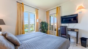 Wake up to stunning views of lush greenery and the sparkling pool right from your cozy, sunlit bedroom. A perfect retreat to start and end your day. 🌿🛌 #LagoaStay #RoomWithAView #RelaxAndRecharge