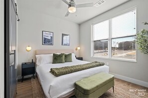 This Guest Bedroom Welcomes You to Unwind. Featuring a King-Size Bed, This Room is Perfect For a Restful Night’s Sleep. The Bed is Dressed with Plush Pillows and Warm Blankets, Creating an Atmosphere That Beckons You To Enjoy a Movie In Bed or Sleep!