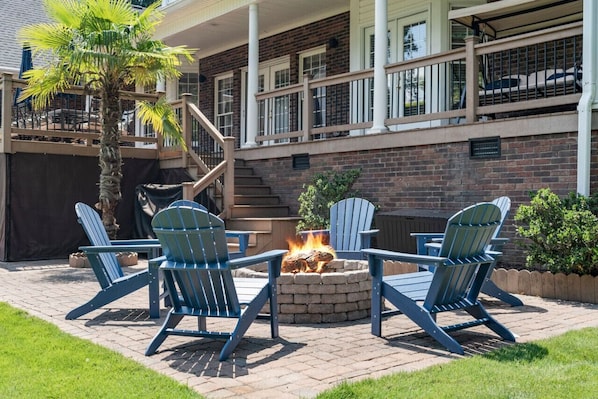 Gather around the firepit with 6 Adirondack chairs… perfect for sharing stories, roasting s’mores, and connecting under a sky full of stars.  Wood is provided.