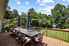 Dine al fresco on our spacious deck with seating for up to 14… perfect for family meals, lively gatherings, and enjoying the great outdoors together!