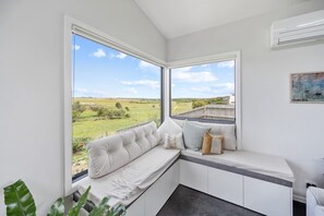 Corner reading nook with bridge views