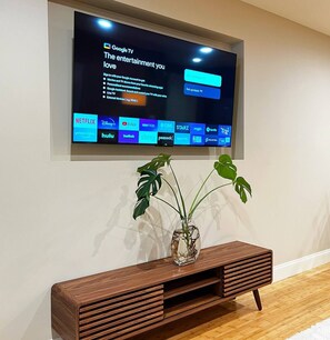 Comfy living room with a smart TV and fast internet.