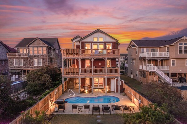 NH293: Saltwater Solace | Rear Exterior - Pool Deck, Fenced Yard, Grill