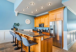 Cooking feels effortless in this bright kitchen complete with bar seating