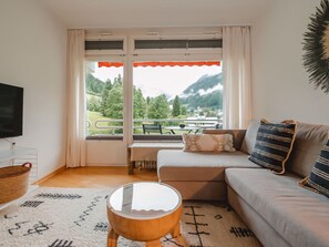 Furniture, Interior Design, Couch, Room, Flooring, Wood, Living Room, Floor, Ceiling, Table