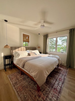 King bed with hybrid mattress and lake view