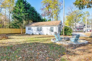 Cottage Exterior | Wood-Burning Fire Pit | Picnic Table | Private Yard
