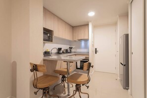 Comedor conectado a la cocina para una experiencia más cómoda