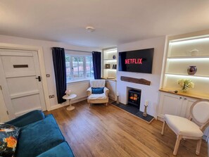A cozy, chic living room perfect for downtime or entertaining.