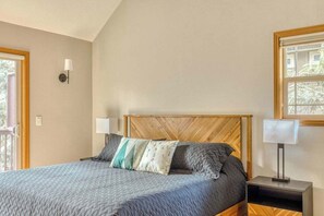 Cozy bedroom with a comfortable king bed and modern design.
