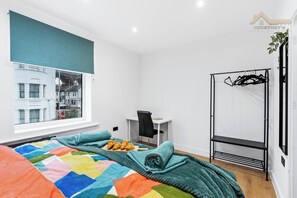 Bedroom 1 SuperKing ( Work Space & Storage)