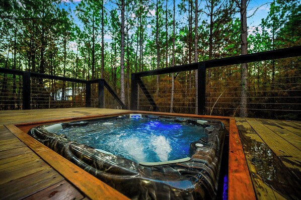 Hot Tub Retreat: Unwind beneath the stars in this private hot tub surrounded by nature!