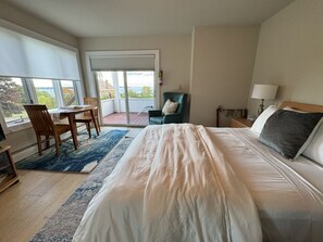 Main Level Bedroom + Dining Area