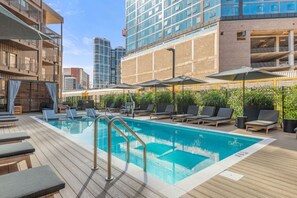 Community Pool w/ cabanas and lounge chairs