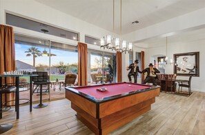 Living Rm converted to fun Game Room with pool table & High-Top Table with Chess