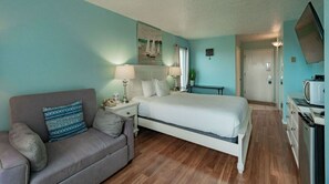 A cozy sitting area offers a comfortable spot to relax, with a seamless flow into the rest of the home.