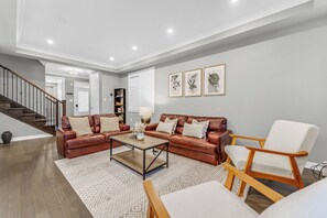 Bright and spacious living room with modern decor.