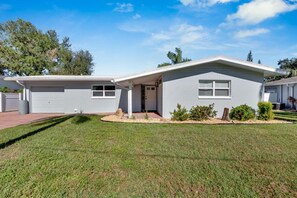 Charming front entrance with private driveway