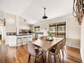 Dine with the whole group with ease with a chic dining table for eight.