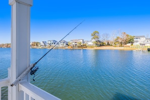 Relax and cast a line from this private dock—perfect for fishing and soaking up the serene waterfront vibes with family and friends!