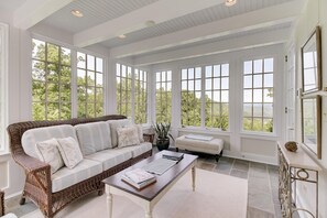 Breathtaking views from every room, including the comfortable sunroom.