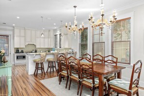 Gorgeous dining table and a fully equipped kitchen.