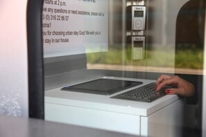 Check-in/check-out kiosk