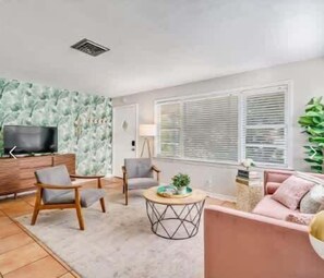 A bright and inviting living room with modern tropical vibes 🌿☀️