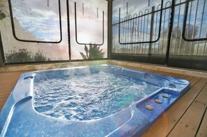 Spa Indulgence - Sink into soothing bubbles in your private spa – the ultimate way to unwind under the stars or in the quiet of morning. 